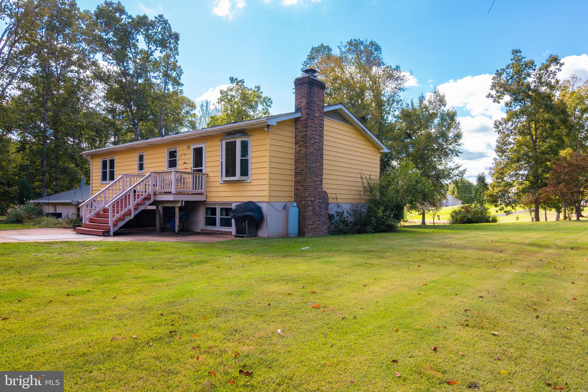 163 Rock Hill Church Road Stafford, VA 22556 - Photo 38 of 43 a view of a house with a yard