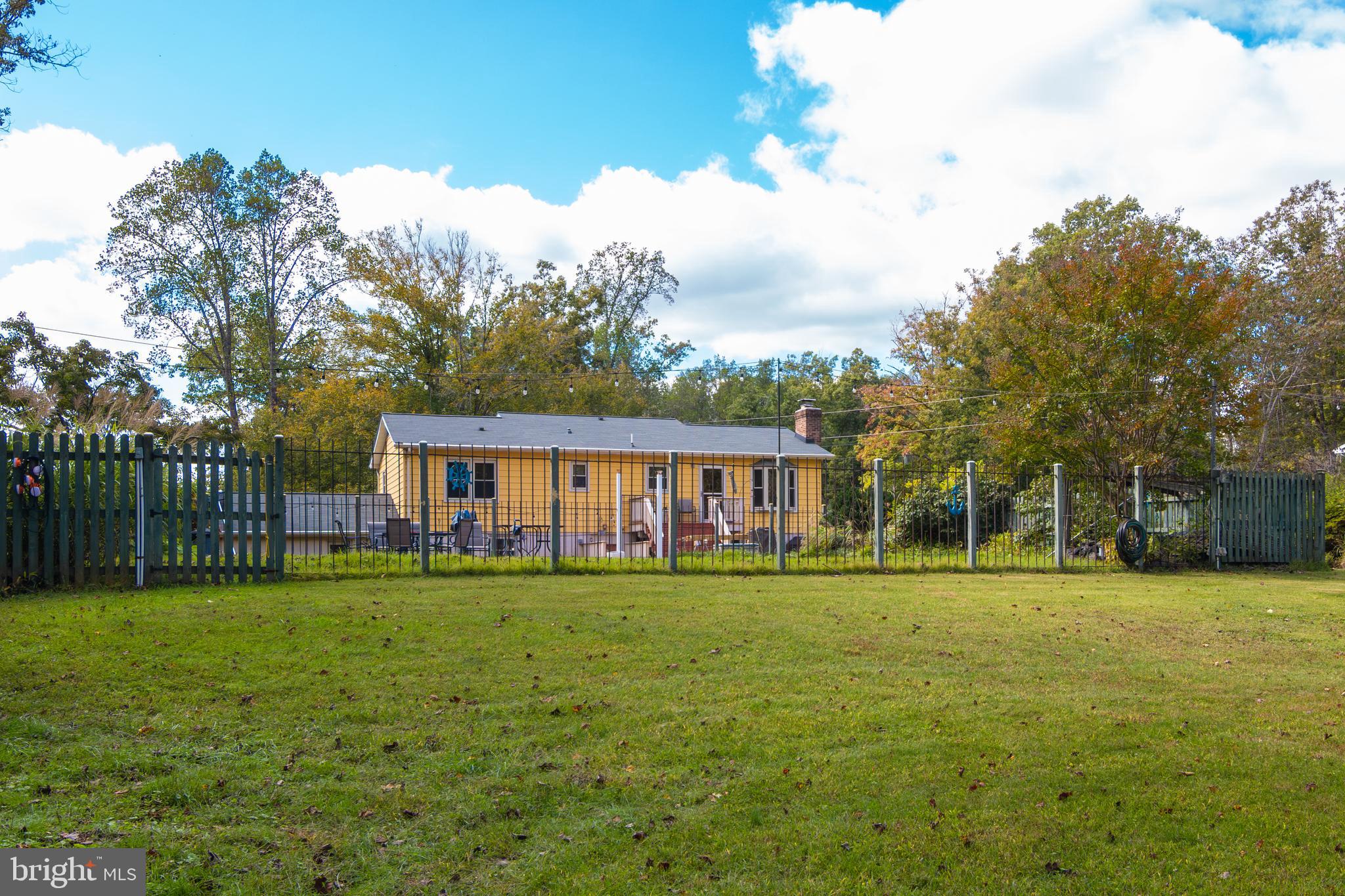 163 Rock Hill Church Road Stafford, VA 22556 - Photo 40 of 43 a front view of a house with a yard