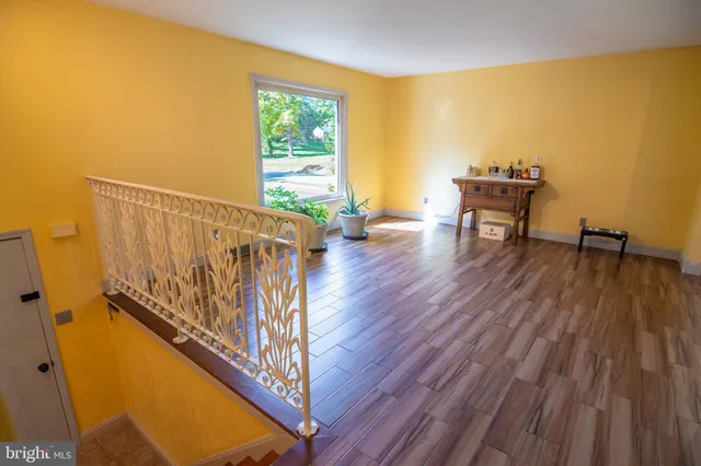 a view of workspace with wooden floor