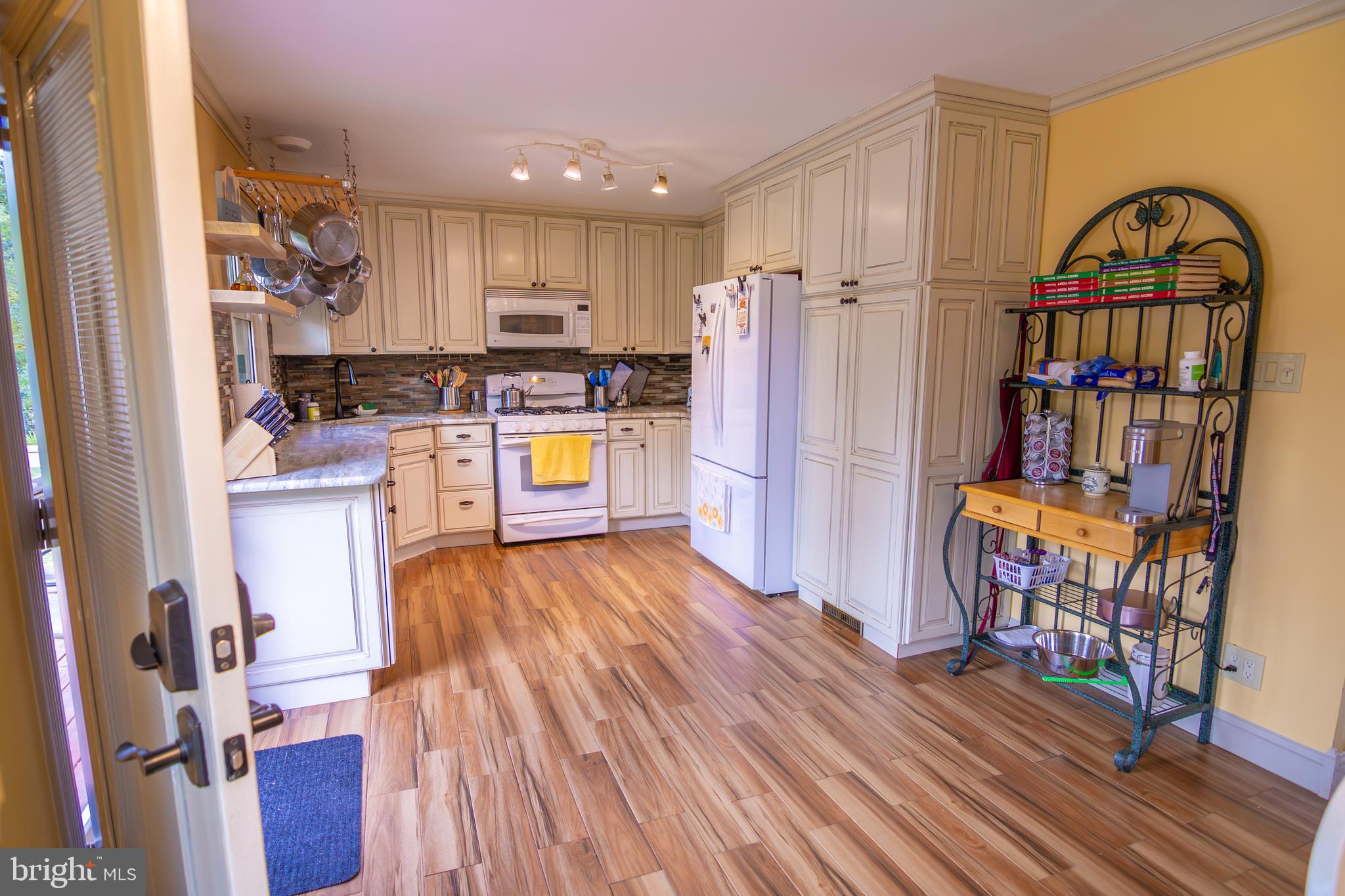 163 Rock Hill Church Road Stafford, VA 22556 - Photo 7 of 43 a view of kitchen with furniture and wooden floor