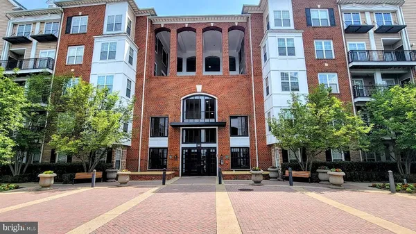a front view of a building with street view