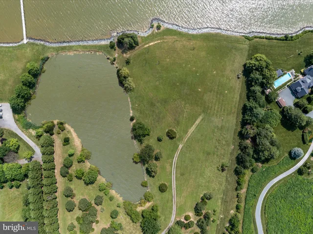 a view of a lake with a yard