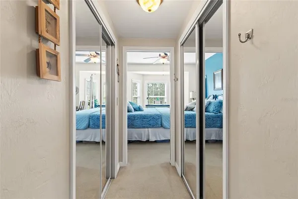 a view of en suite bathroom with sink and glass door