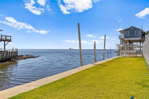 a view of a balcony with an ocean view