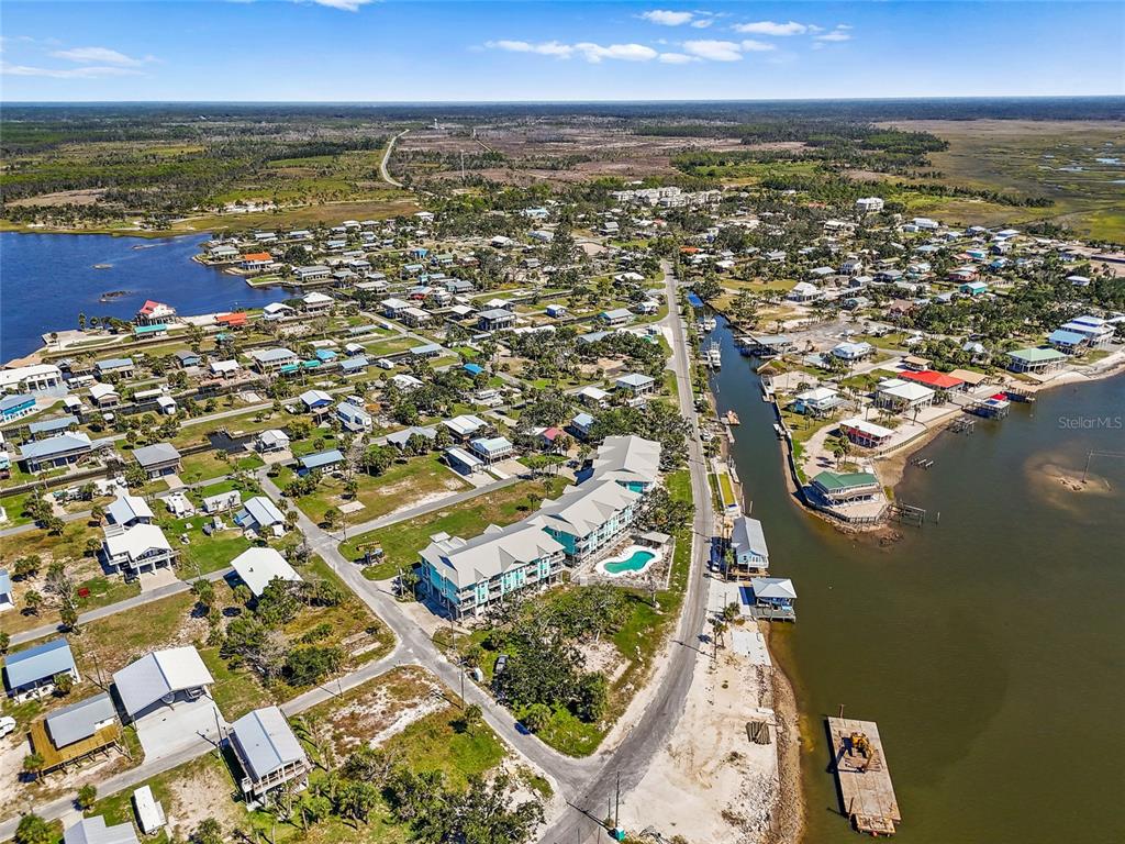502 Main Street, Unit 112 Horseshoe Beach, FL 32648 - Photo 44 of 45 an aerial view of residential building and ocean