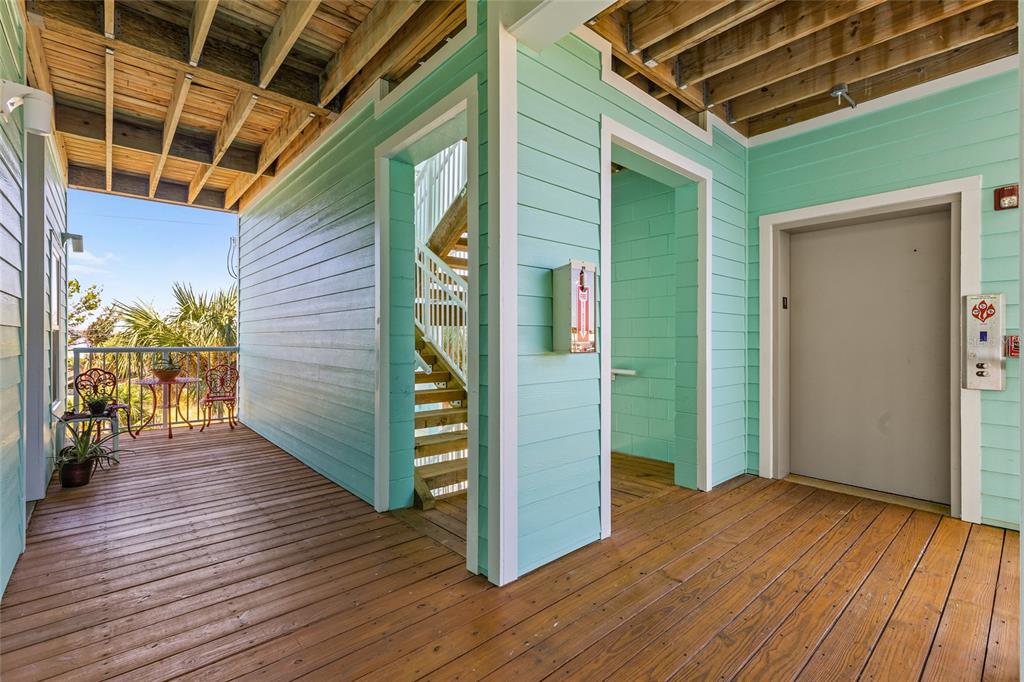 502 Main Street, Unit 112 Horseshoe Beach, FL 32648 - Photo 5 of 45 a view of hallway with wooden floor