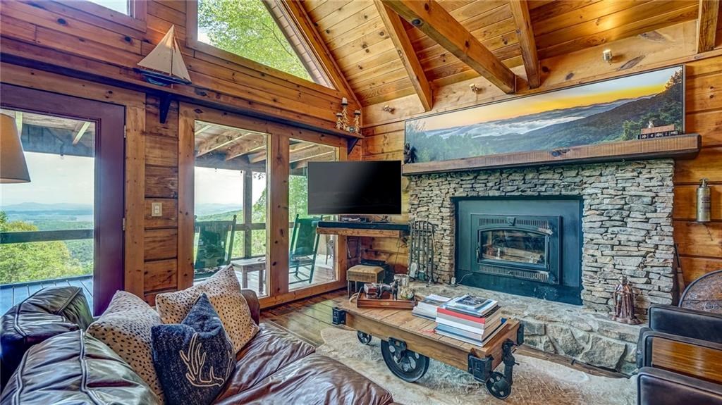 Undisclosed Address Blue Ridge, GA 30513 - Photo 12 of 51 a living room with furniture fireplace and flat screen tv