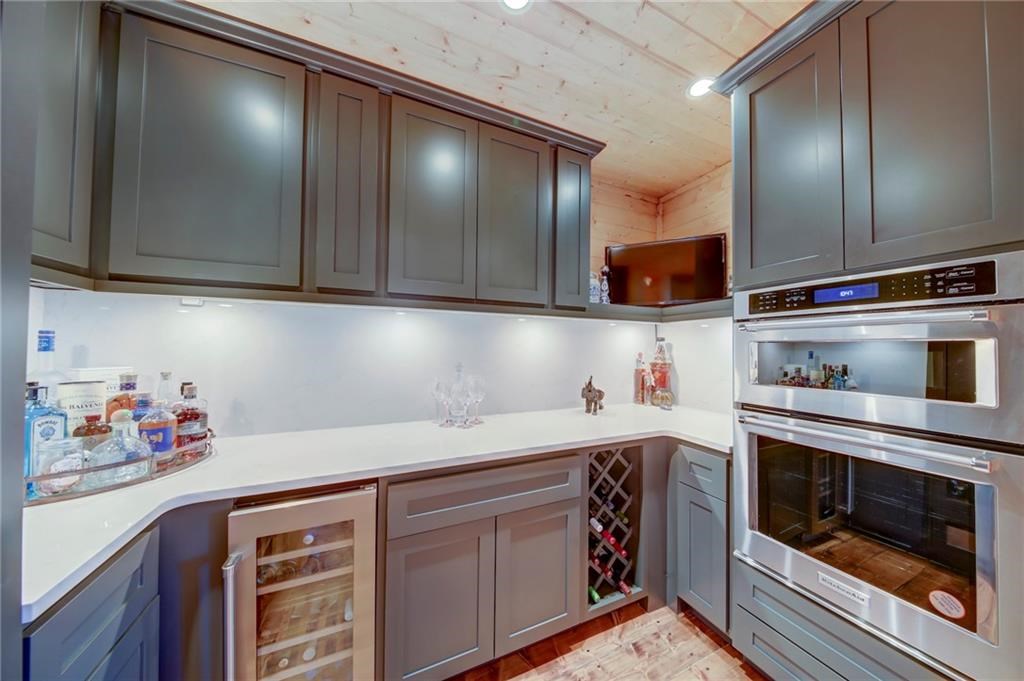 Undisclosed Address Blue Ridge, GA 30513 - Photo 18 of 51 a kitchen with granite countertop cabinets stainless steel appliances and a sink