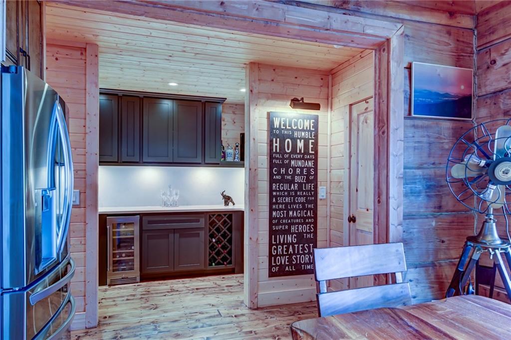 Undisclosed Address Blue Ridge, GA 30513 - Photo 19 of 51 a view of a livingroom with furniture and staircase