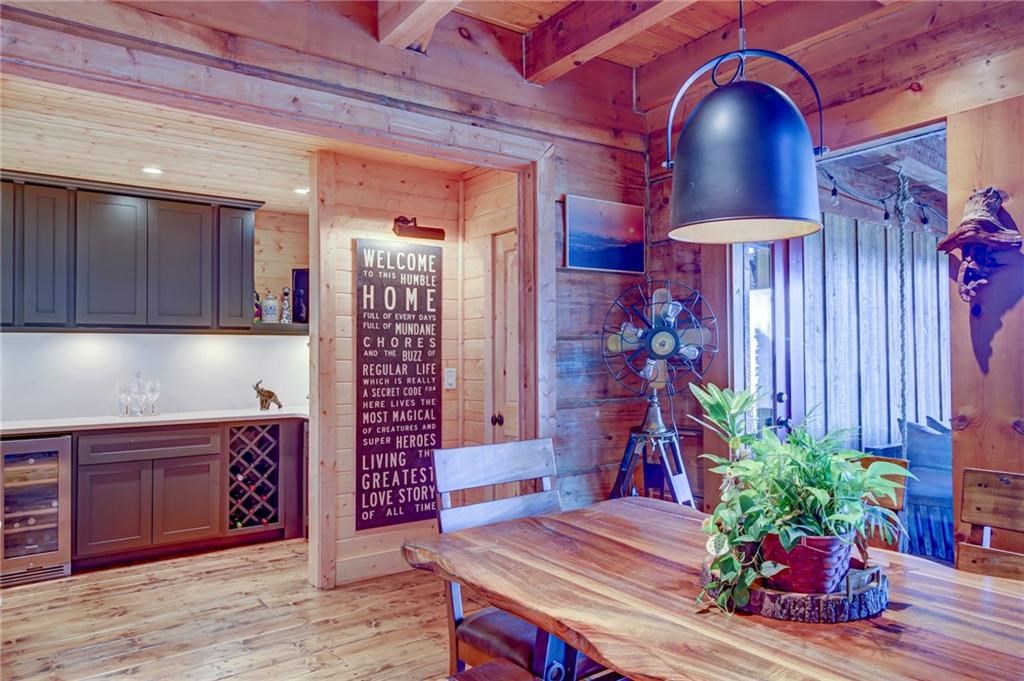 Undisclosed Address Blue Ridge, GA 30513 - Photo 20 of 51 a room with furniture and a potted plant