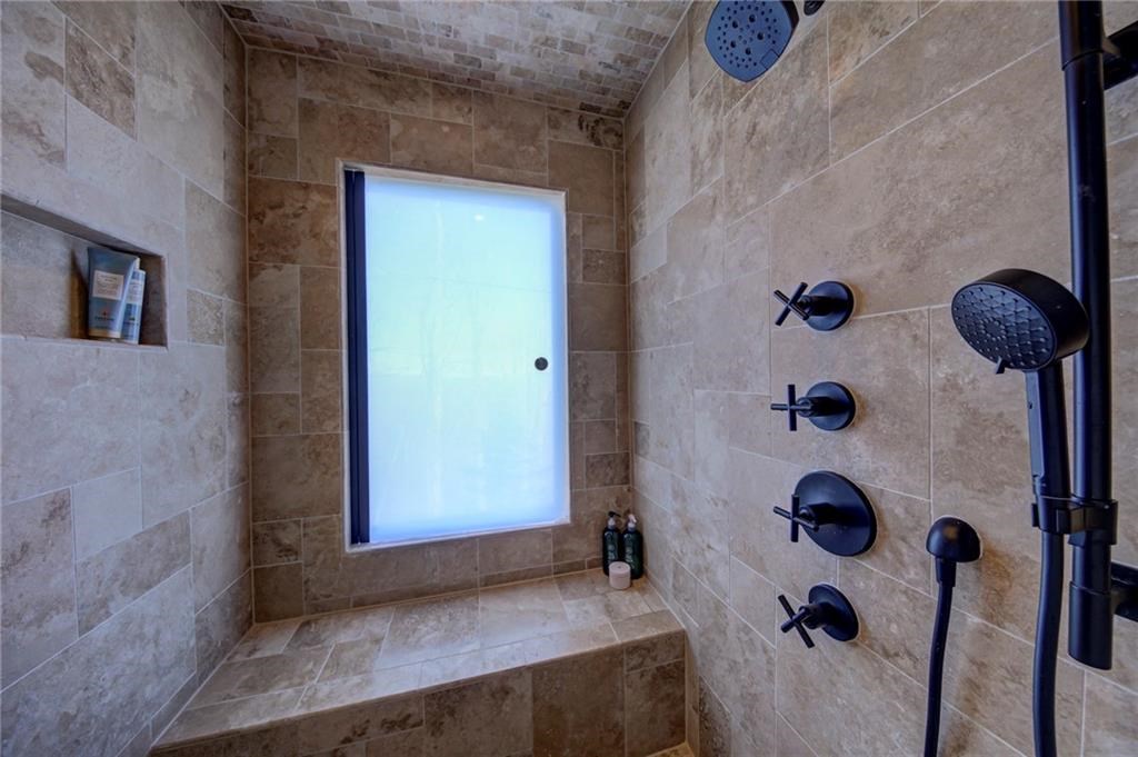 Undisclosed Address Blue Ridge, GA 30513 - Photo 34 of 51 a bathroom with a tub and shower