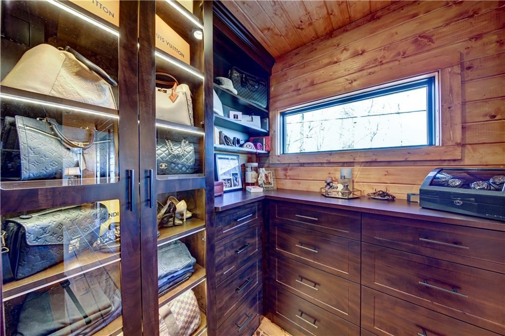 Undisclosed Address Blue Ridge, GA 30513 - Photo 38 of 51 a kitchen with wooden cabinets and a stove