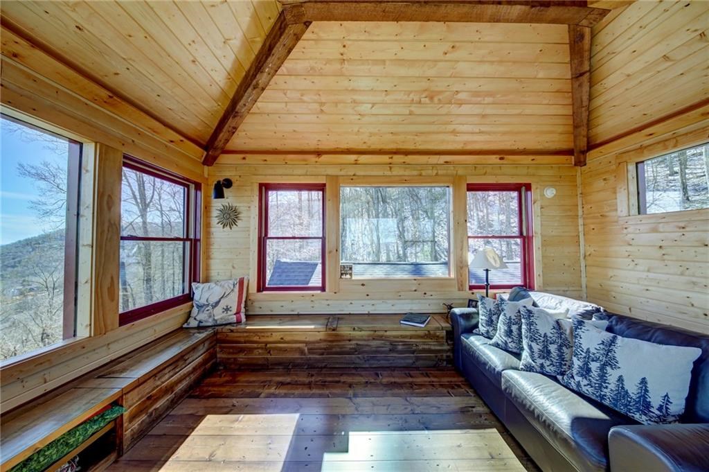 Undisclosed Address Blue Ridge, GA 30513 - Photo 42 of 51 a living room with furniture and a rug