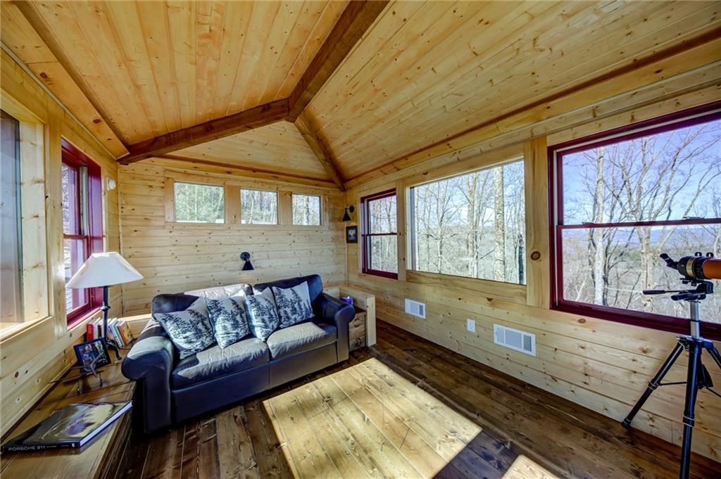Undisclosed Address Blue Ridge, GA 30513 - Photo 43 of 51 a living room with furniture and a window