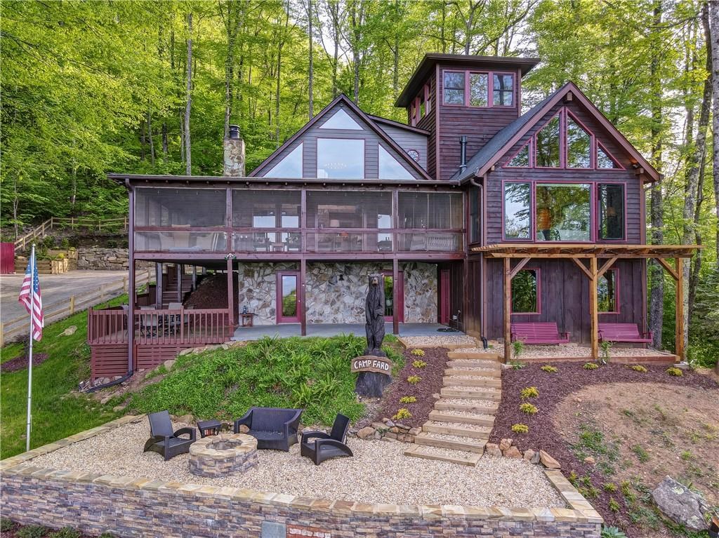Undisclosed Address Blue Ridge, GA 30513 - Photo 46 of 51 a front view of a house with garden