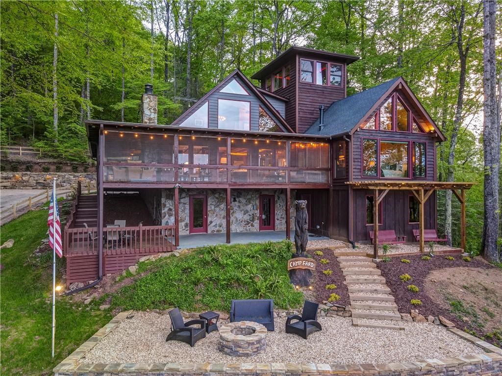 Undisclosed Address Blue Ridge, GA 30513 - Photo 49 of 51 a front view of a house with garden