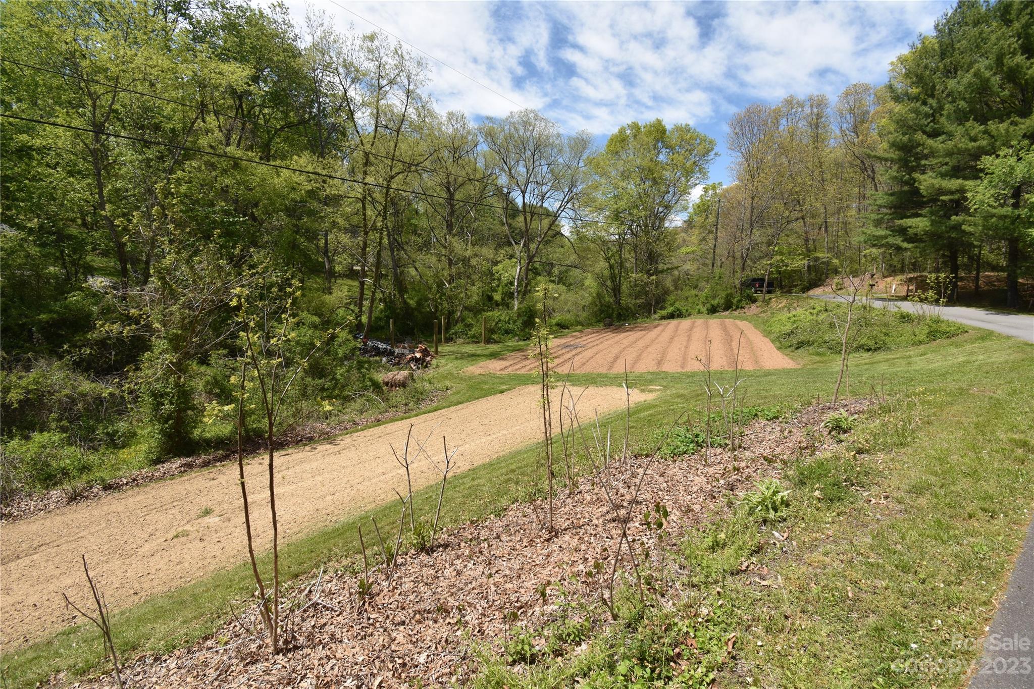 30 Stoney Brook Drive, Unit 30 Clyde, NC 28721 - Photo 1 of 11 a view of a pathway both side of yard