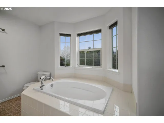 a bathroom with a sink and a bathtub