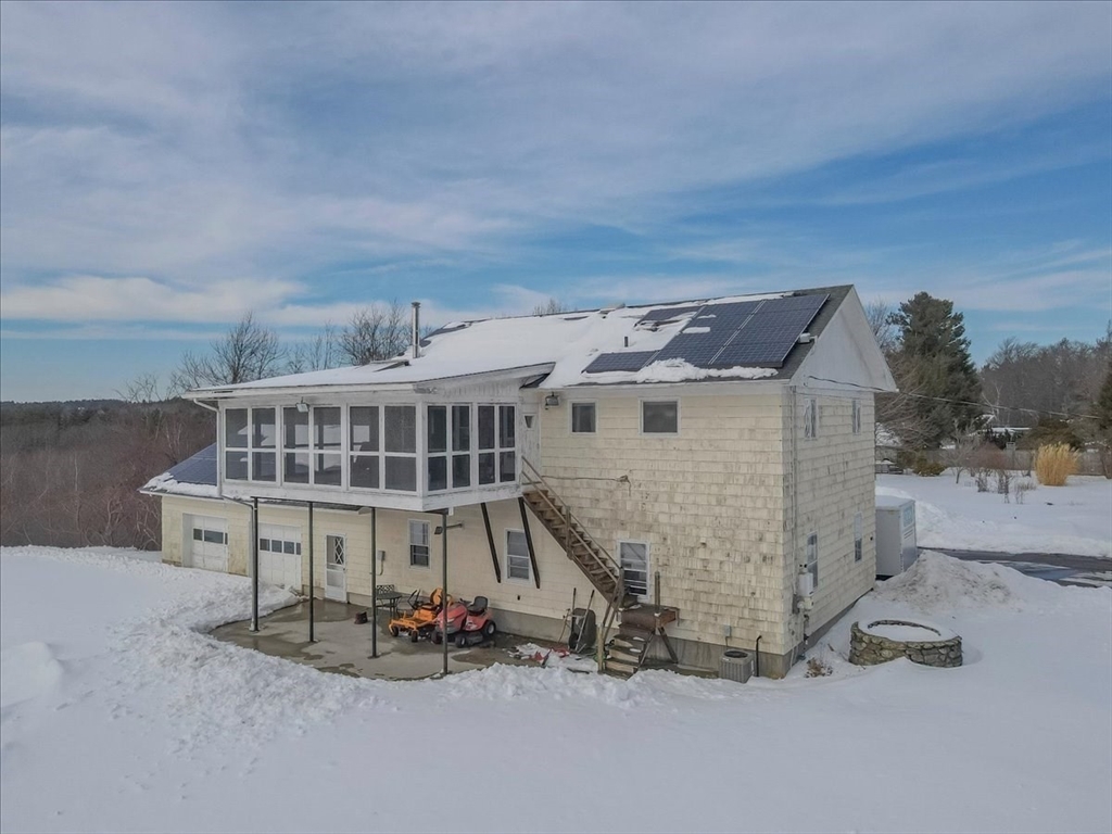1083 Mt Elam Road Leominster, MA 01420 - Photo 24 of 30 a view of a house with a patio