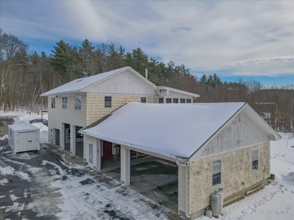 1083 Mt Elam Road Leominster, MA 01420 - Photo 26 of 30 a aerial view of a house with a yard and balcony