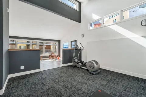 a very nice looking room with wooden floor