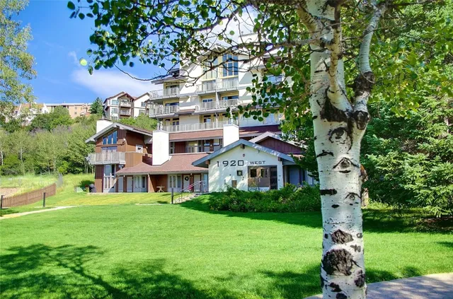 front view of a building with a yard