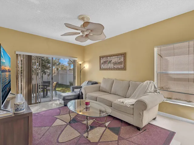 a bedroom with a bed and a chair