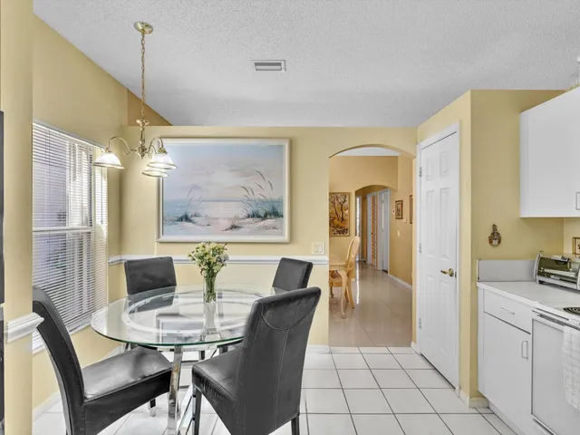 a view of a walk in closet and bathroom