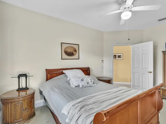 a bathroom with a toilet and shower