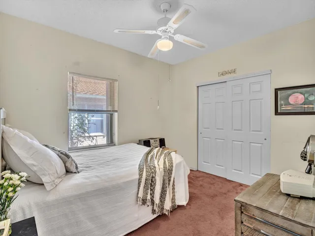 a view of a house with a yard porch and sitting area