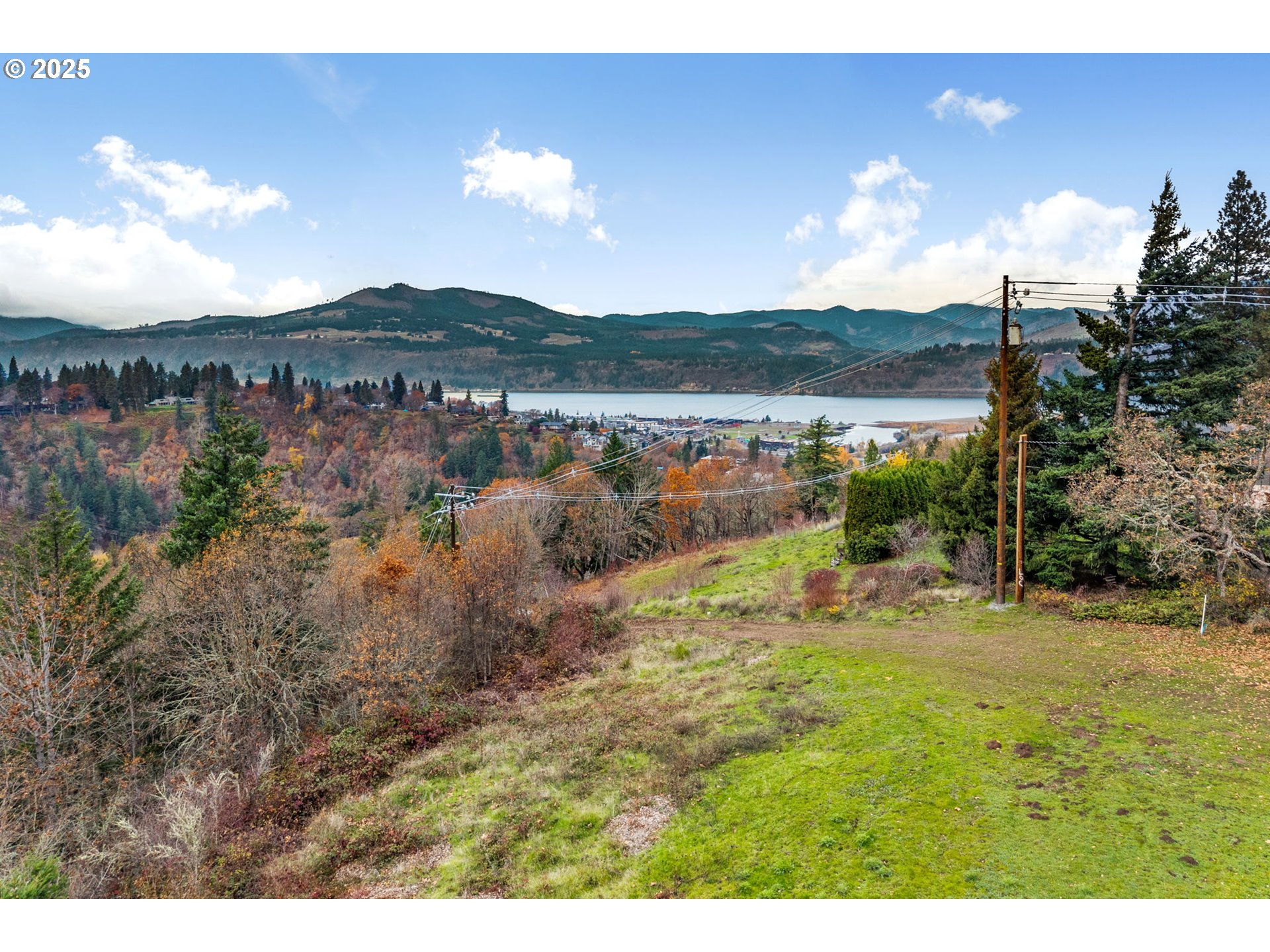 710 Highline Road Hood River, OR 97031 - Photo 28 of 36 a view of a lake with a mountain in the background