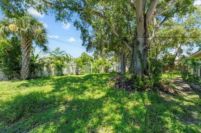 a view of outdoor space and a yard