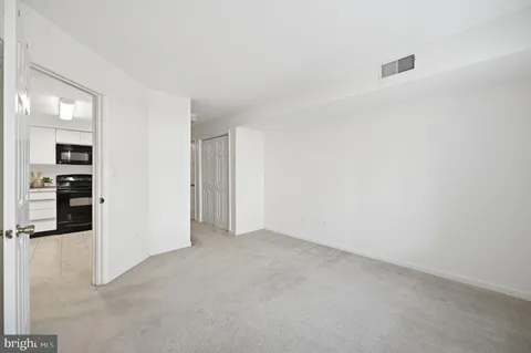 an empty room with closet