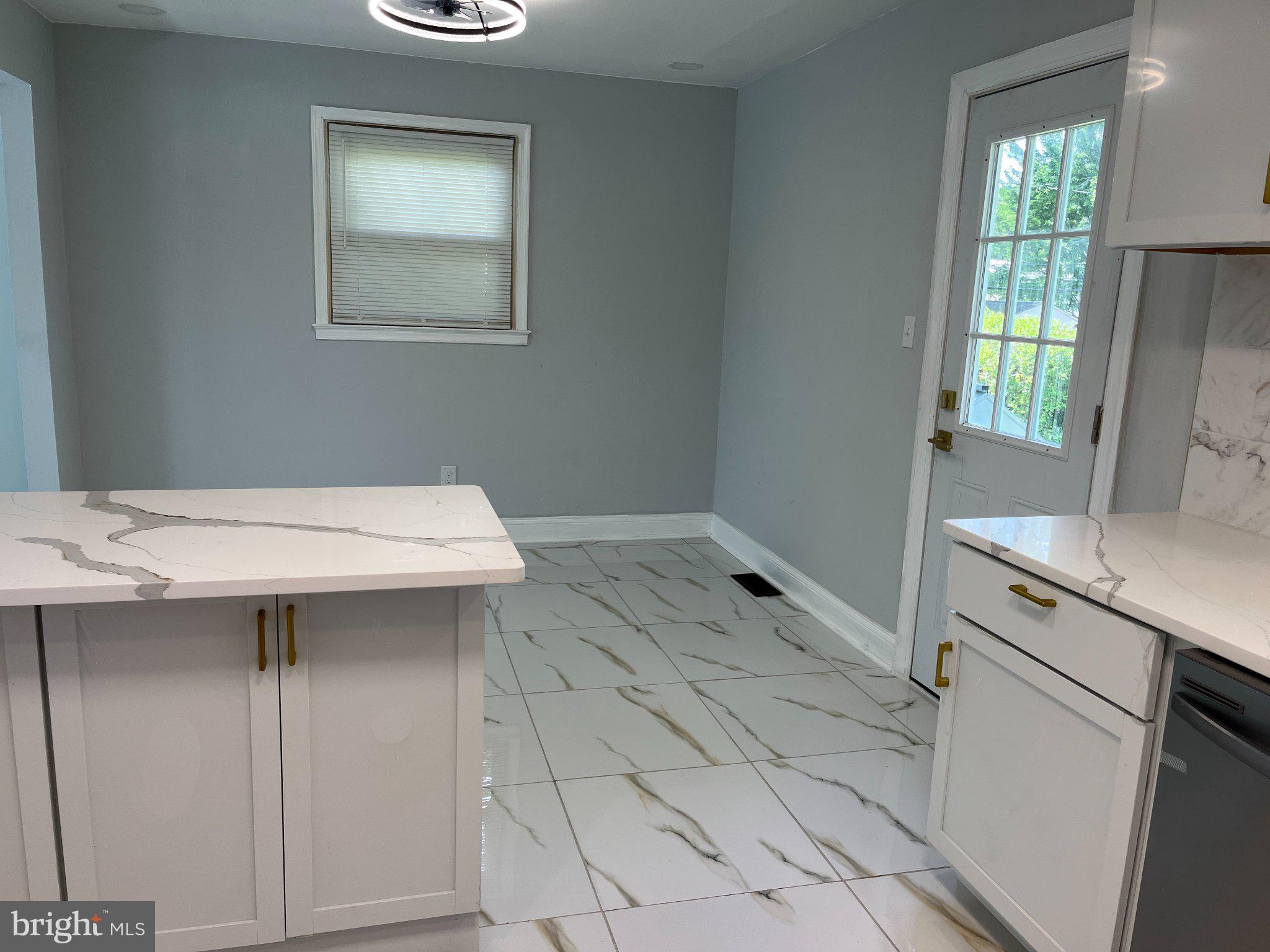 2405 Limestone Road Wilmington, DE 19808 - Photo 15 of 40 a bathroom with a sink and a mirror