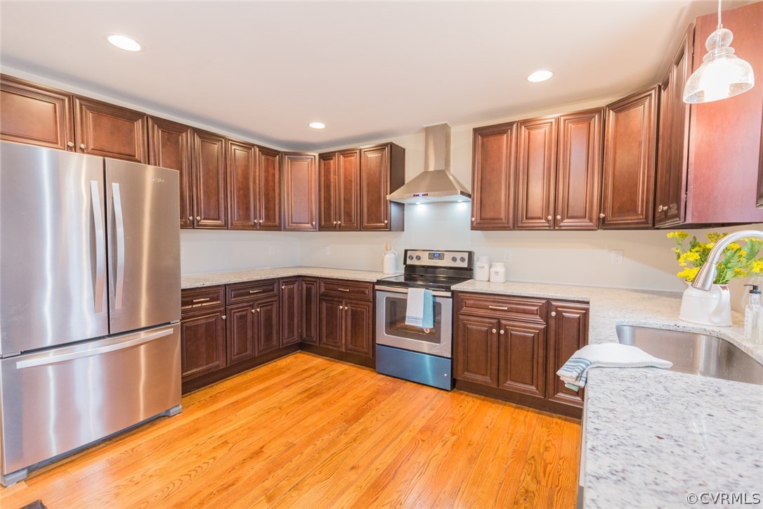 1016 Three Chopt Road Manakin-Sabot, VA 23103 - Photo 16 of 44 a kitchen with stainless steel appliances granite countertop a refrigerator sink and cabinets