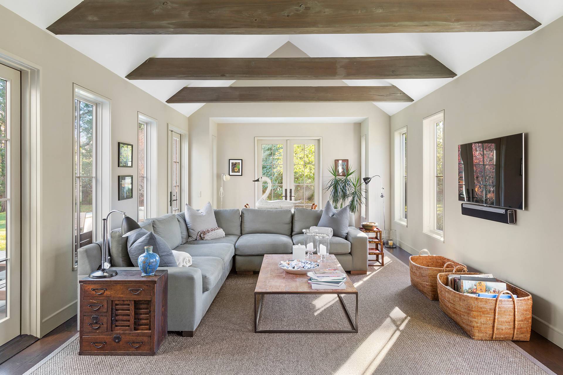 467 Further Lane Amagansett, NY 11930 - Photo 12 of 23 a living room with furniture and a large window