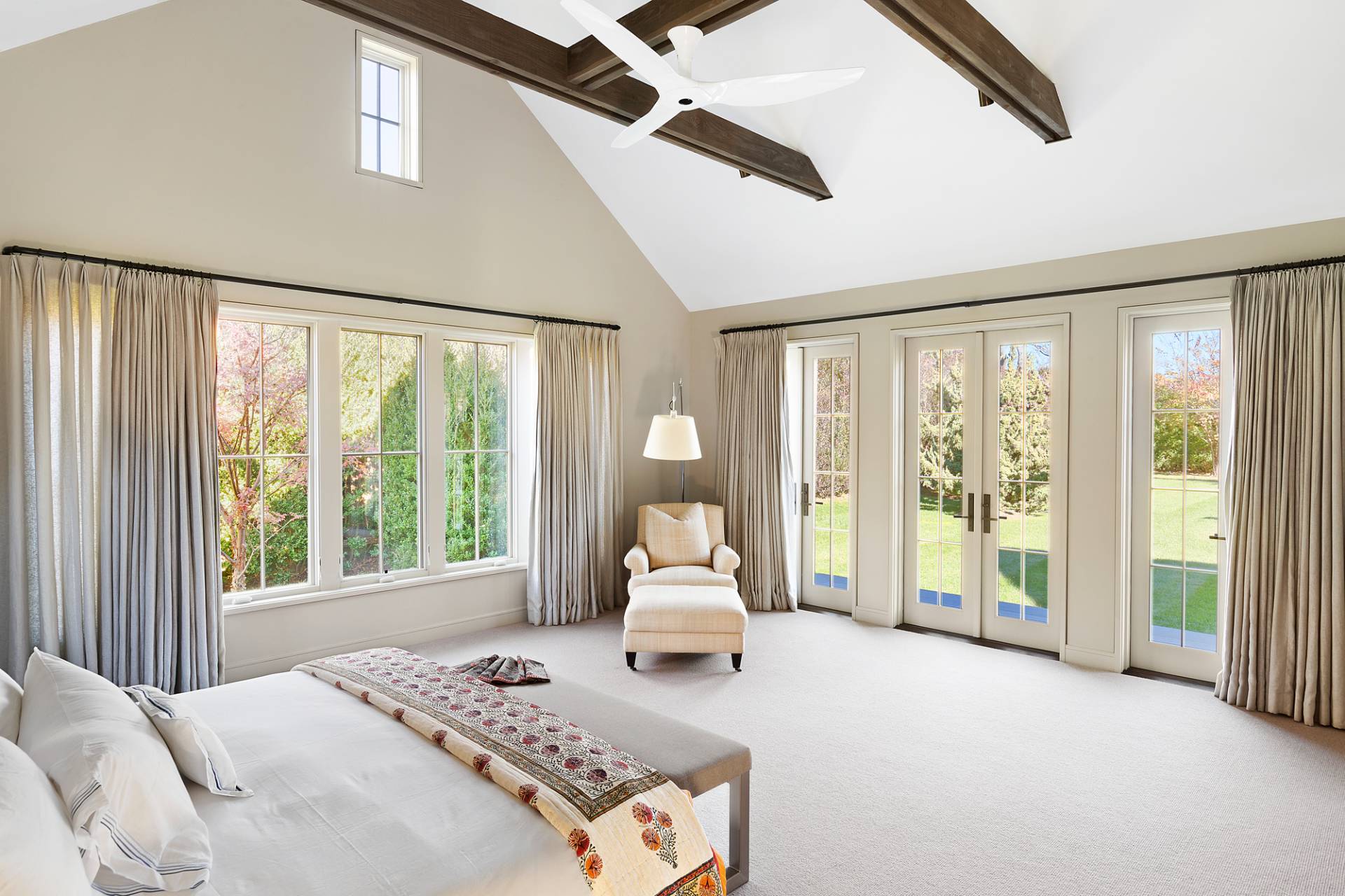 467 Further Lane Amagansett, NY 11930 - Photo 13 of 23 a bedroom with a bed and large windows