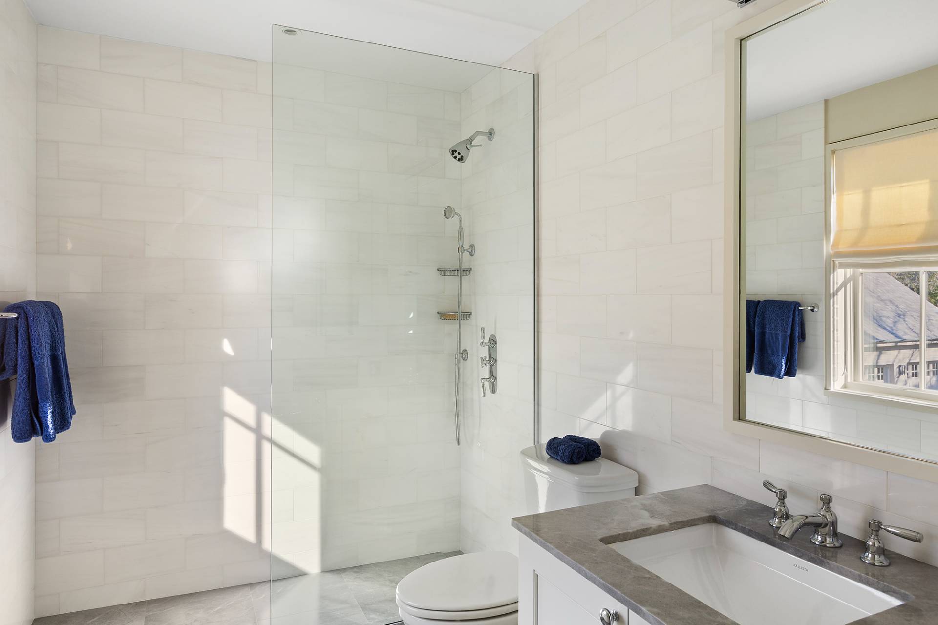 467 Further Lane Amagansett, NY 11930 - Photo 17 of 23 a bathroom with a granite countertop sink toilet and shower
