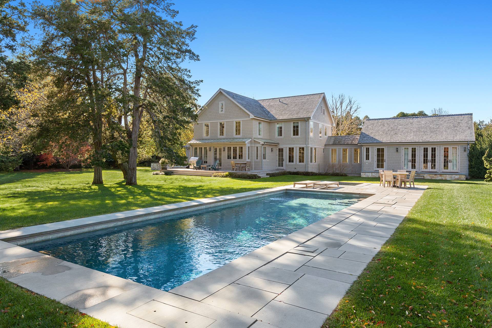 467 Further Lane Amagansett, NY 11930 - Photo 3 of 23 a view of a house with swimming pool and a yard