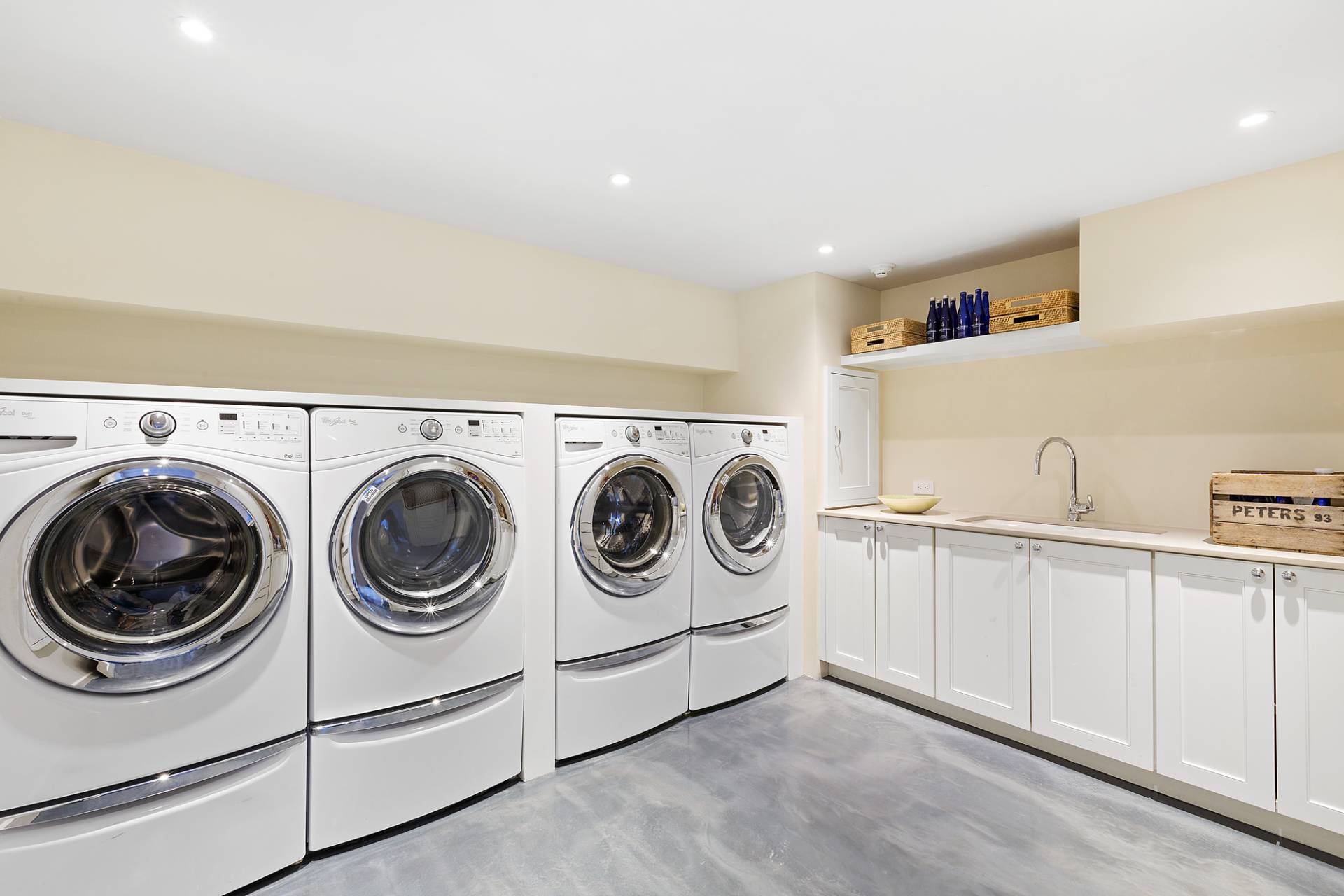 467 Further Lane Amagansett, NY 11930 - Photo 23 of 23 a utility room with dryer and washer