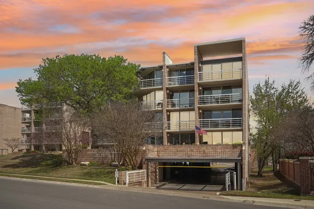 a view of a building with a street