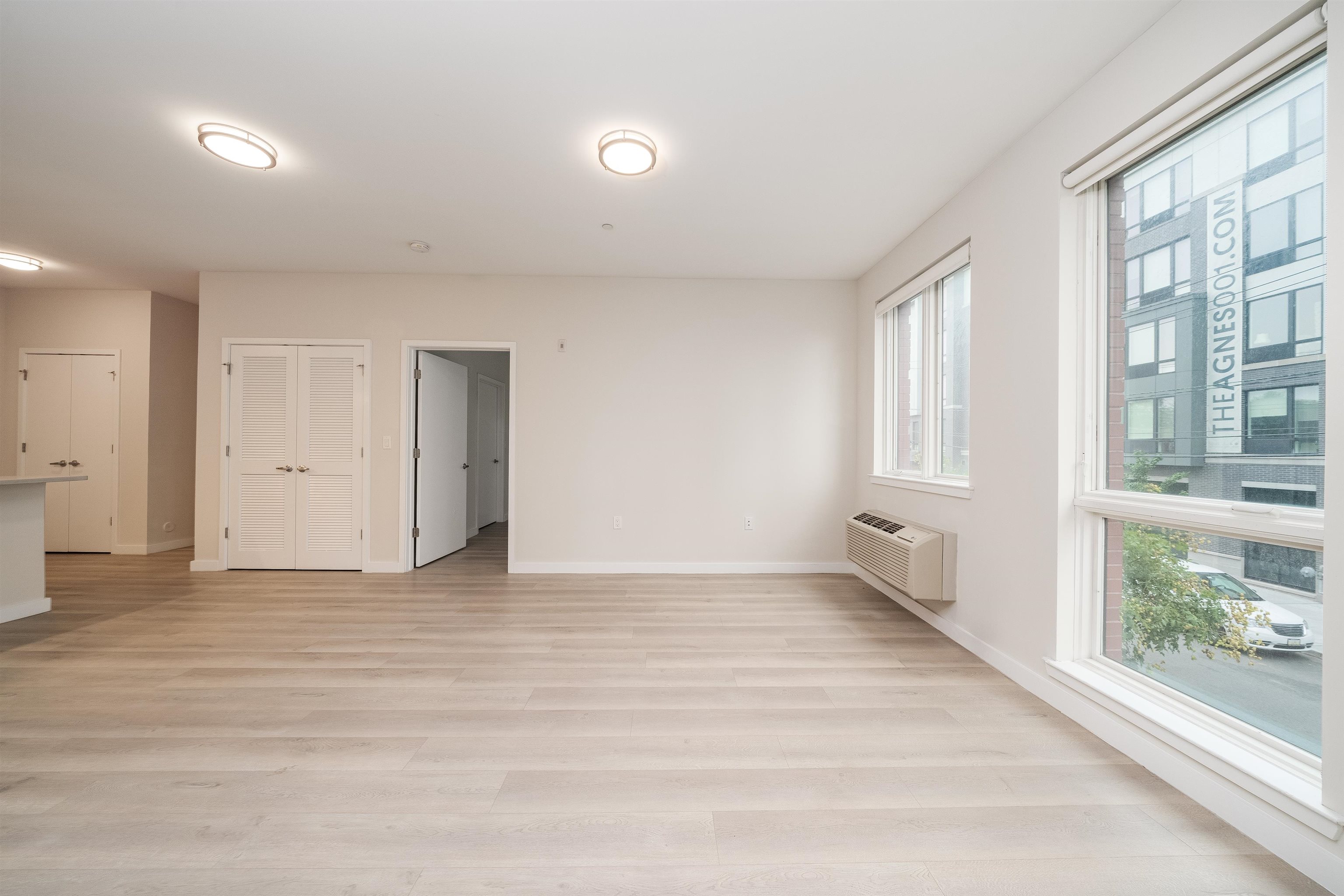 16 Bennett Street, Unit 504 Jersey City, NJ 07304 - Photo 11 of 24 a view of an empty room with a window