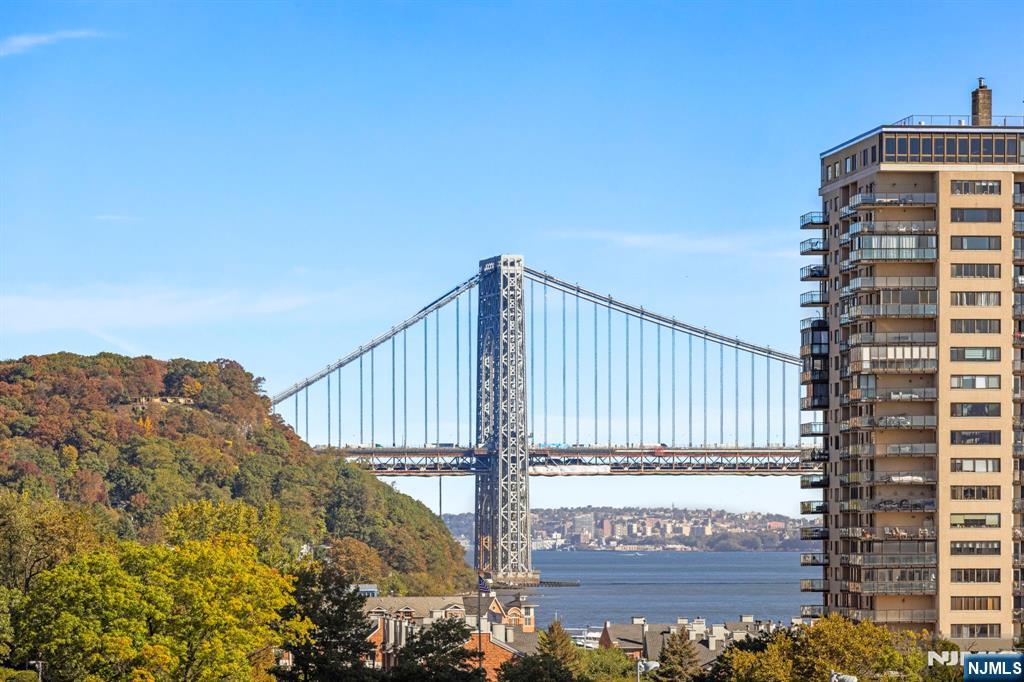 67 Highway 5 Edgewater, NJ 07020 - Photo 17 of 24 a view of balcony with wooden fence