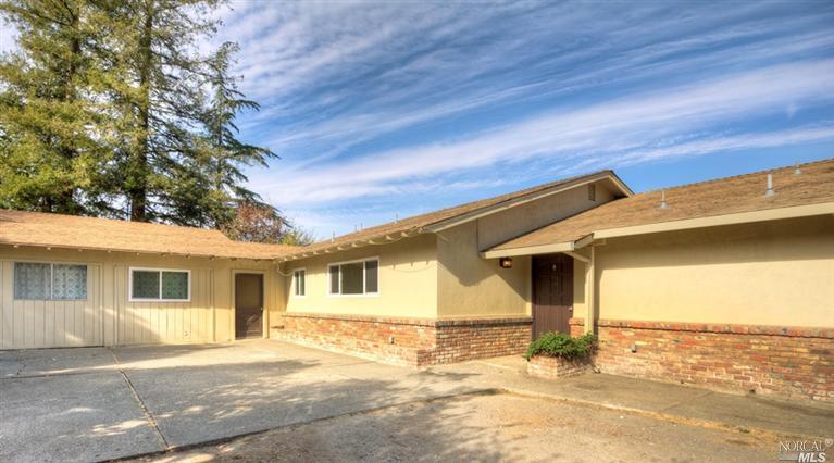 4537 Grange Road Santa Rosa, CA 95404 - Photo 1 of 1 a front view of a house with a yard