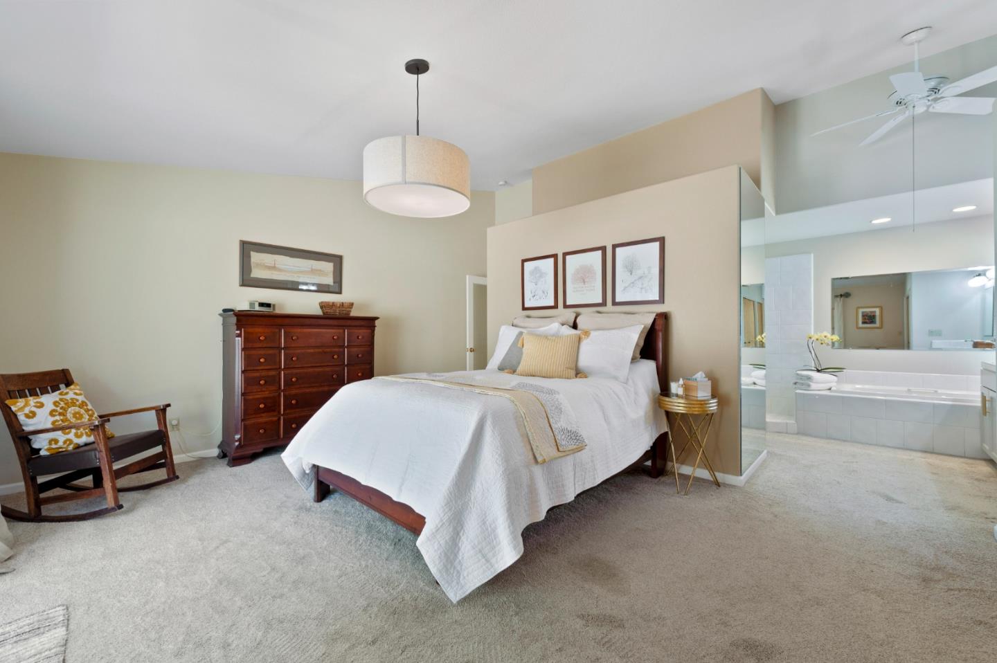 481 Maher Road Watsonville, CA 95076 - Photo 20 of 34 a spacious bedroom with a bed and a chandelier