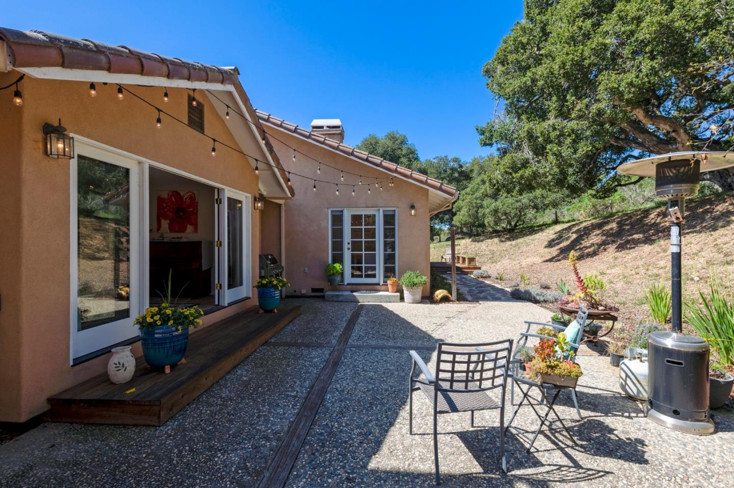 481 Maher Road Watsonville, CA 95076 - Photo 26 of 34 a view of a house with backyard sitting area and garden