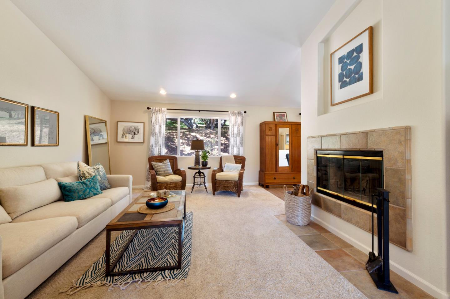 481 Maher Road Watsonville, CA 95076 - Photo 10 of 34 a living room with furniture a flat screen tv and a fireplace