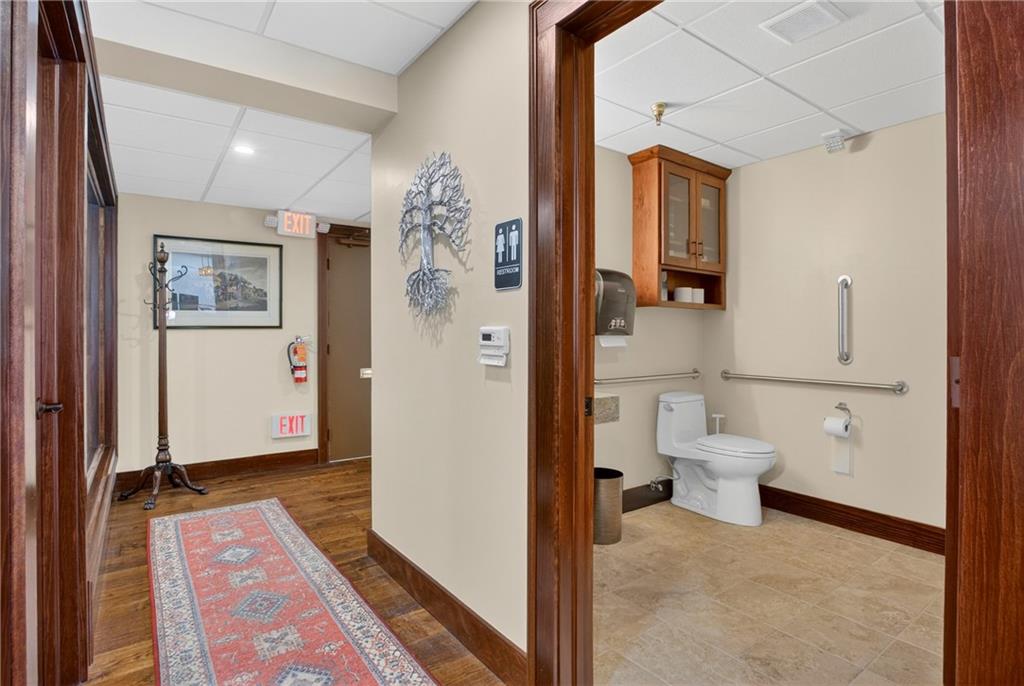 750 Washington Road Pittsburgh, PA 15228 - Photo 13 of 44 Hallway from reception area to rear office, accessible bathroom to right and conference room to left