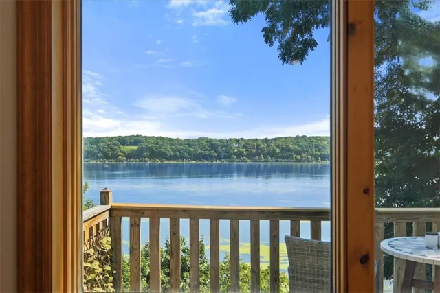a view of a lake from a balcony
