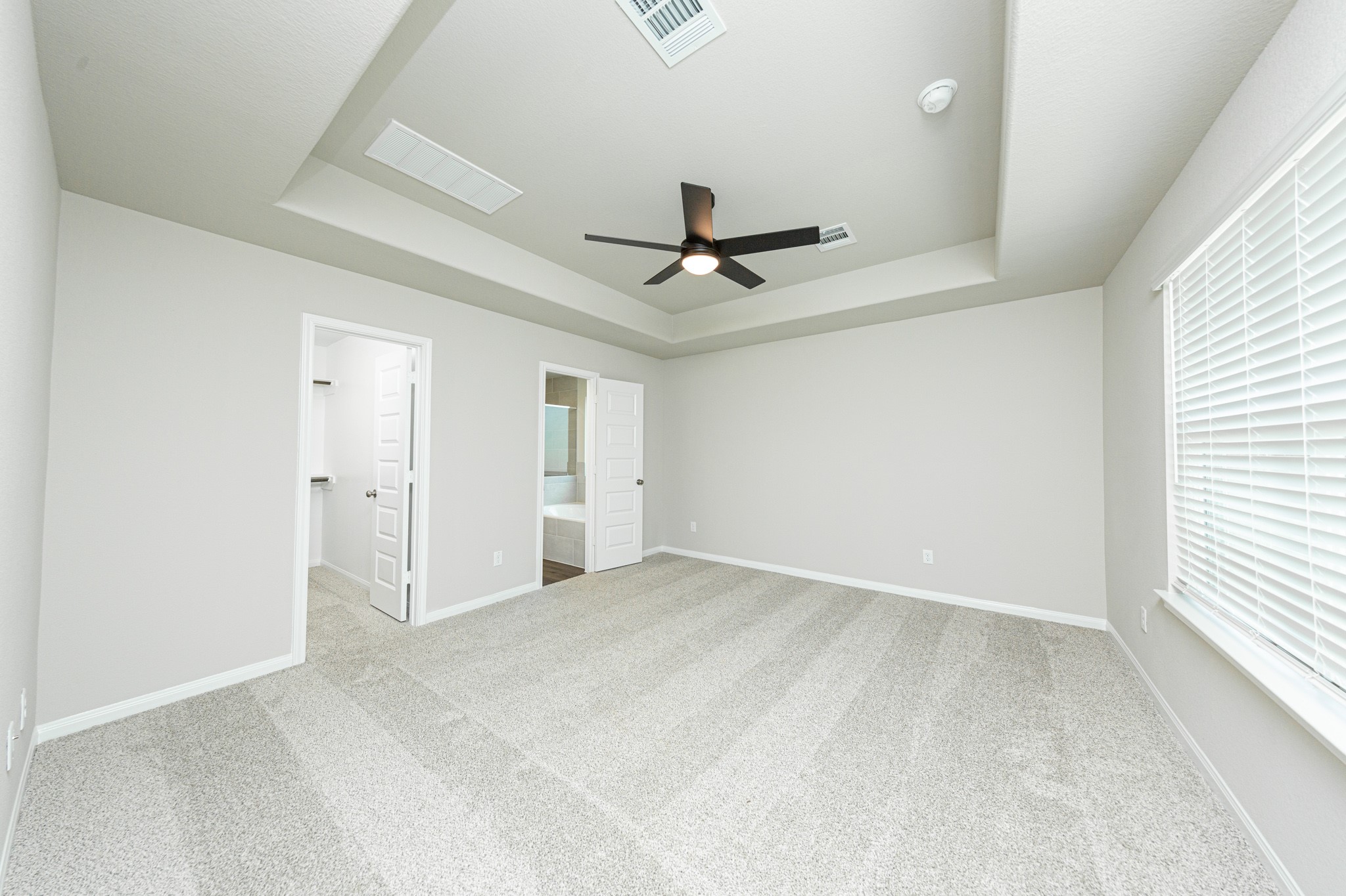 13654 Kit Run Splendora, TX 77372 - Photo 7 of 24 wooden floor in an empty room with a window